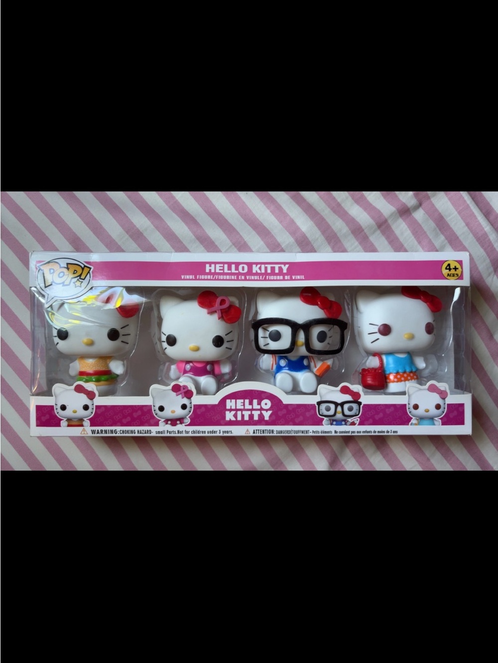Hello Kitty Vinyl Figure Set - White, Pink, Red, Blue Accents 4-Pack